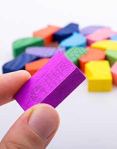 手头逻辑拼图的多彩片段长方形教育玩具积木学习学校动机创造力建造商业图片