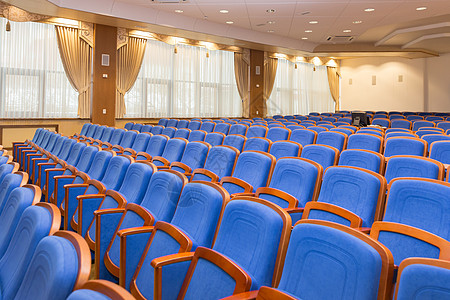 带有蓝色座位的会议厅戏剧娱乐剧院家具音乐会电影团体展示礼堂观众图片