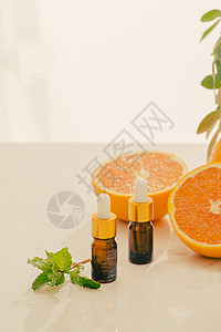 含柠檬 橙子 橘子和白底维生素C的棕色瓶子药品疗法香气水果芳香排毒治疗温泉化妆品血清图片
