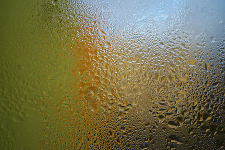 玻璃杯或瓶子外面结露流动飞沫墙纸波纹水滴反射滴水天气雨滴环境图片