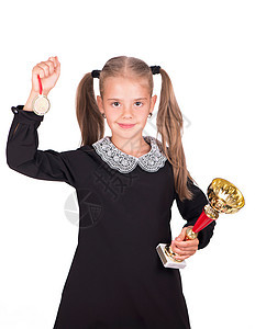 白人女孩拿着白种背景孤立的奖杯和奖牌写作背包学校孩子小姑娘小学生女性办公室幼儿园补给品图片