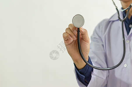 手举着一个医学听诊器 紧贴在医生的手上脉冲医师心脏病学病人护士疾病医院职业心脏病考试图片