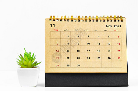 2021年11月的办公桌日历规划师桌子商业时间表空白组织办公室会议时间旅行背景图片