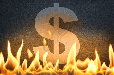 在火焰中燃烧的美元象征物图片