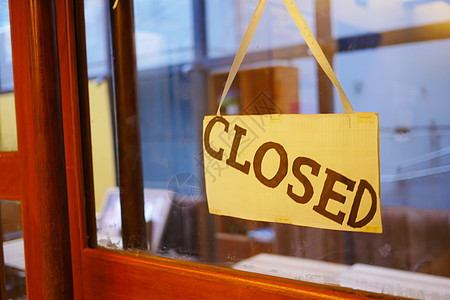咖啡厅门上挂着封闭标志民众零售店铺服务危机图片