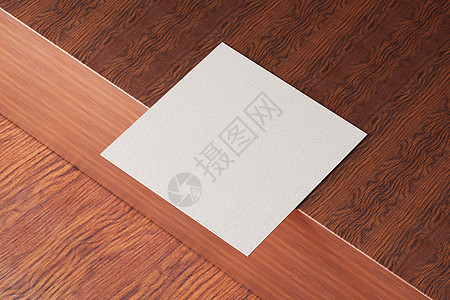 木制棕色桌子背景上的白色方形纸制名片样机 品牌展示模板印刷图形设计 一张卡片模拟 3D插画渲染横幅办公室纸板公司邮政信封木头小样图片