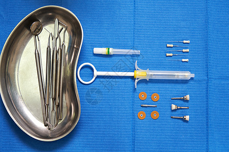 一套不消毒密封包装的牙科仪器组关心医生雕刻师手术工具蓝色技术口腔科工作牙医图片