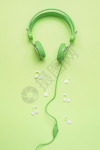 有白色音符的绿色耳机 高品质照片图片