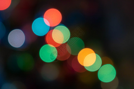 五颜六色的灯泡和生动的圆形散景灯树节日气氛闪电派对魔法浮华运动星星星系火花金光踪迹奢华图片