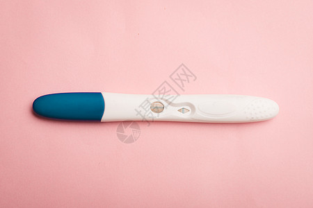 粉红色背景上的妊娠试验 阳性试验 怀孕复制空间母亲药品生活女性症状药物婴儿生育力激素摄影图片