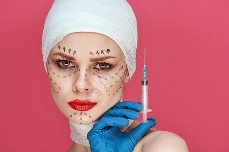 红嘴唇整容手术 脱肩 粉红色背景 赤色背景女士手套皮肤身体外科女孩程序成人病人医生图片