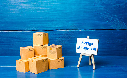 一堆箱子和存储管理画架 一套有效组织仓库货物存储 自动化和会计的措施 简化官僚程序图片