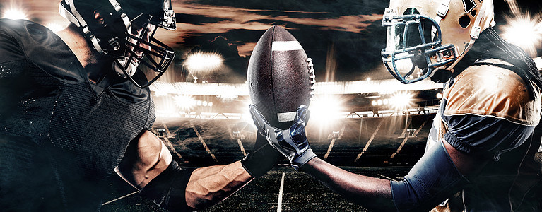 两个美国足球运动员在体育场上玩球 运动概念训练齿轮行动挑战男性黑暗男人竞赛竞争者头盔图片