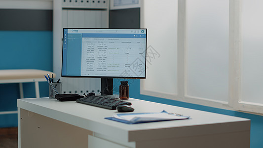 特写计算机屏幕 在办公桌上提供病人信息乐器装饰内阁药品考试诊断桌子仪器办公室治疗图片