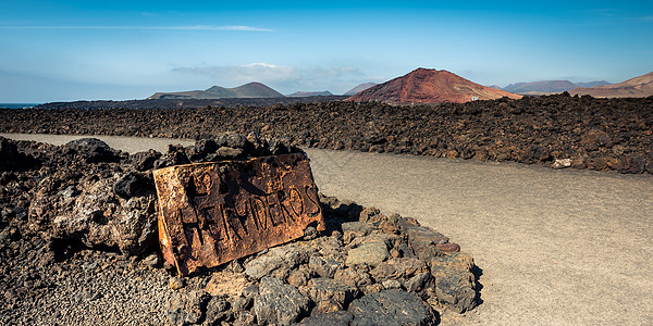 濒危物种热带晴天海浪冒险休息石头岩石旅游火山日落图片