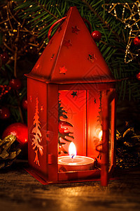 红圣诞节烛台季节蜡烛桌子金子玻璃星星庆典火焰假期烛光图片