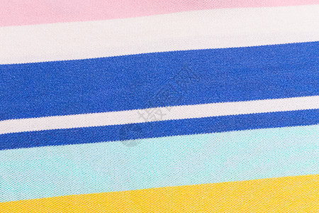 美丽的夏日背景 由蓝色 黄色 粉红色的精细颜色条纹布织而成图片