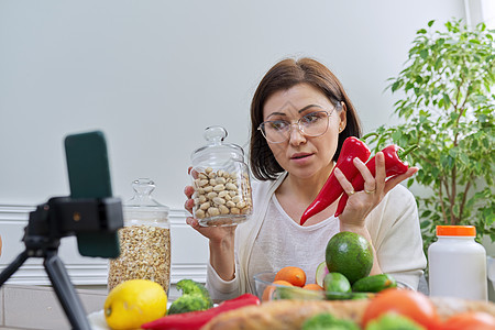 使用智能手机 有关健康饮食的博客专家引导流重量蔬菜女士营养师营养学谷物营养办公室卫生保健图片