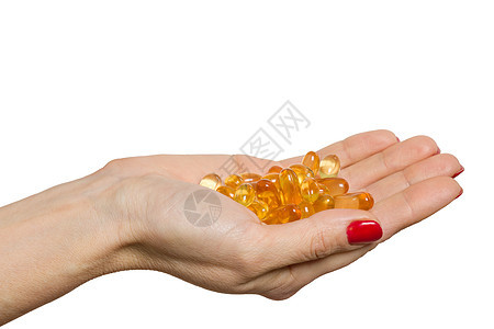 白色背景的欧米茄3号单独手持胶囊养分手指药品食物药店饮食疾病治疗剂量鳕鱼图片