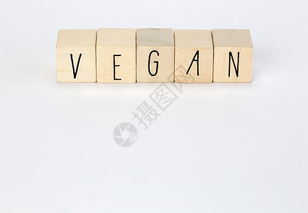 素食主义者和主题标签用木制立方体和自然装饰写成 在白色背景上与复制空间隔离素食主义者 素食主义者 健康概念背景现代设计自然风格字图片