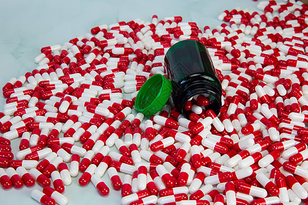 白色背景红白胶囊瓶 维生素 药物或药物背景 健康 医疗和商业概念治疗药剂疼痛剂量化学品止痛药制药玻璃药店垃圾图片