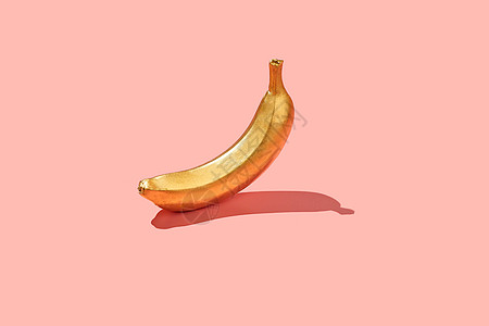 夏天与黄色香蕉一起制作 其背景是明亮的粉红色 夏季概念最小 (笑声)图片