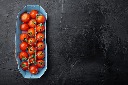 红熟樱桃番茄 黑色背景 有复制文本空间西红柿文字纹理食物红色背景图片