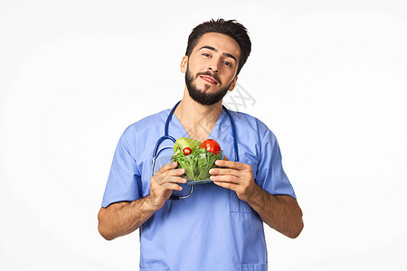 口袋有蔬菜的丰盛饮食人手握着蔬菜维他命健康食品实验室营养师食物工作室运动医院男性水果沙拉营养图片