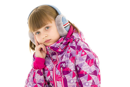一个带耳机的小女孩 听音乐器具设备年龄电子电子产品白色线索电脑青少年青春期图片