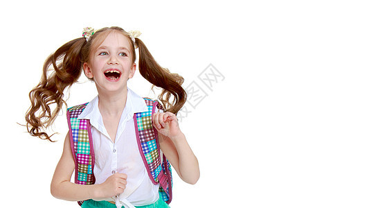 女学生用公文包跳跃乐趣教育快乐女士微笑背包童年青年头发喜悦图片