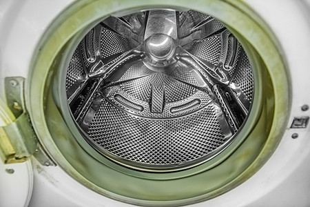 洗衣机鼓和包装板印上肮脏的旧绿色涂层金属家务艺术洗衣店离心机技术器具机器垫圈海豹图片