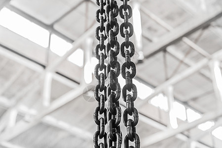 工业车间或工厂背景下桥式起重机起重机构铁链的工厂设备链机器绳索技术起重机吊装工程绞盘高架建造吊带图片