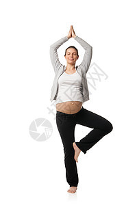 从事锻炼的美丽的孕妇保健母亲体操成人腹部女性瑜伽地面福利姿势图片