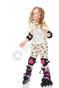 小女孩滚式滑板孩子们公园旱冰冰鞋乐趣运动滚筒孩子活动溜冰者图片