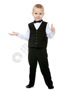 穿黑西装打领带的特伦蒂小男孩套装微笑白色学校孩子人士衬衫商业童年商务图片