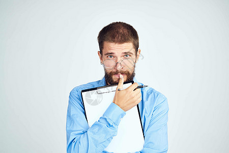 蓝衬衫文件经理专业的胡子男子情感人士胡须男人成功成人领带办公室男性头发图片
