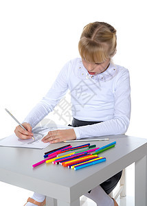一个小女孩在桌子上画画青年乐趣幼儿园教育幸福创造力活动艺术女孩女性图片
