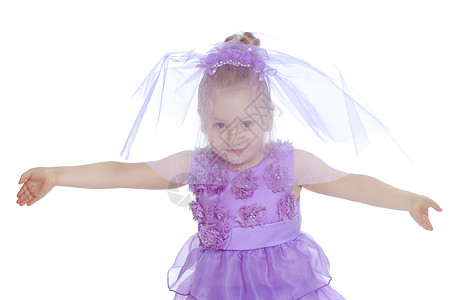 穿紫色裙子的小女孩长发快乐冒充手势幸福童年孩子女性手指工作室图片