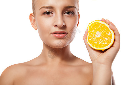 青春美丽的年轻女人 橙色加白白色治疗女士女性橙子女孩眼睛食物工作室活力化妆品图片