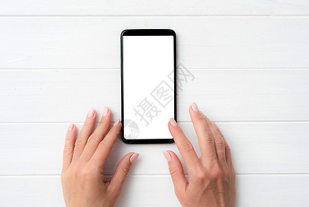 手握白屏幕的黑人智能手机技术桌子用户白屏互联网女性电脑白色触摸屏电子图片