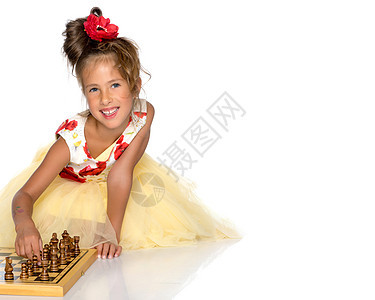 女孩下象棋女性思考教育孩子战略男性智力竞赛学习幸福图片