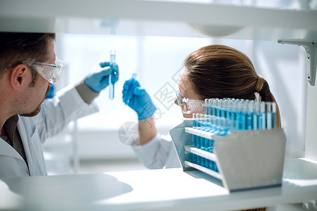 实验室研究人员背景图药品研究员实验女性管子测试工人学习科学化学家图片