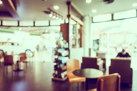 摘要摘要模糊了咖啡厅内地咖啡馆零售店铺顾客购物中心商业桌子餐厅咖啡店椅子背景图片