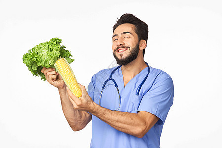 口袋有蔬菜的丰盛饮食人手握着蔬菜维他命健康食品水果男人排毒玻璃营养药品沙拉工作室食物营养学图片