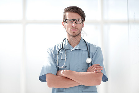 穿蓝制服自信的外科医生手术中心眼镜健康男人操作治疗工作专家药品图片