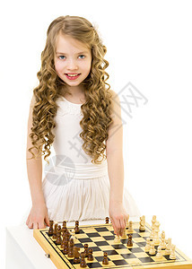 女孩下象棋活动男性运动玩家艺术木板棋盘游戏思维童年图片