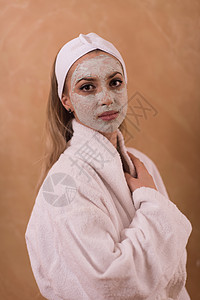 施用面罩的斯帕妇女身体奶油润肤女孩化妆品工作室奢华肤色皮肤成人图片