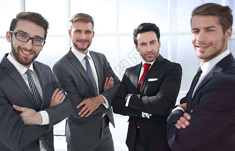 一组成功的商业界人士在近距离接近职员会议公司员工商业同事办公室经理套装男性图片