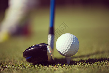 草地高尔夫球俱乐部和球场俱乐部课程宏观运动球座游戏挑战娱乐高尔夫球球道图片