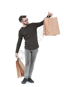 携带礼品的人的全年身长顾客消费者购物者购物包装微笑食物男人店铺纸板图片